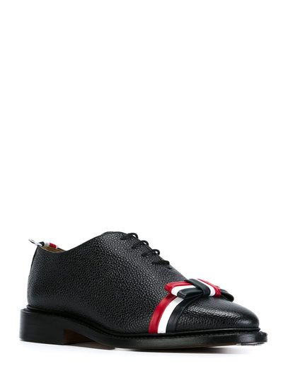 Pebble Grain Bow Wholecut Shoes (Black)